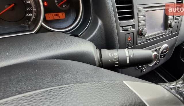 Чорний Ніссан Тііда, об'ємом двигуна 1.8 л та пробігом 112 тис. км за 6500 $, фото 13 на Automoto.ua