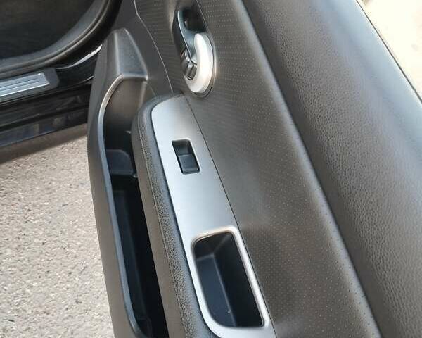 Черный Ниссан Тиида, объемом двигателя 1.8 л и пробегом 110 тыс. км за 6199 $, фото 14 на Automoto.ua