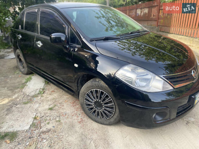 Черный Ниссан Тиида, объемом двигателя 1.6 л и пробегом 182 тыс. км за 3250 $, фото 6 на Automoto.ua