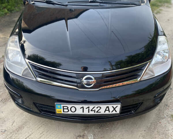 Черный Ниссан Тиида, объемом двигателя 1.6 л и пробегом 182 тыс. км за 3250 $, фото 5 на Automoto.ua