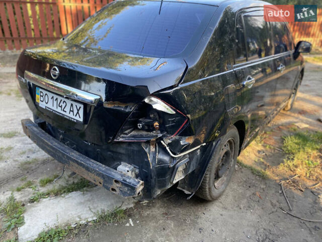Черный Ниссан Тиида, объемом двигателя 1.6 л и пробегом 182 тыс. км за 3250 $, фото 9 на Automoto.ua
