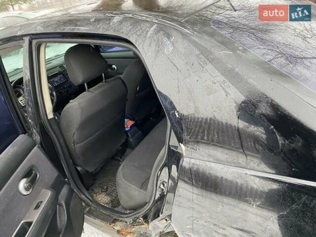 Черный Ниссан Тиида, объемом двигателя 1.6 л и пробегом 182 тыс. км за 3200 $, фото 14 на Automoto.ua