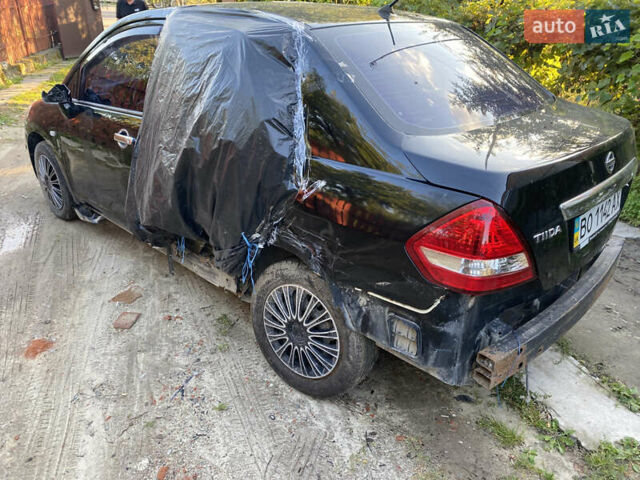Черный Ниссан Тиида, объемом двигателя 1.6 л и пробегом 182 тыс. км за 3250 $, фото 8 на Automoto.ua