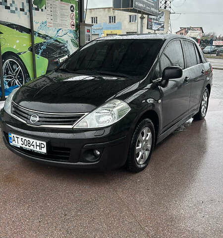 Черный Ниссан Тиида, объемом двигателя 1.6 л и пробегом 220 тыс. км за 6450 $, фото 3 на Automoto.ua