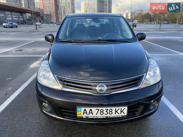 Черный Ниссан Тиида, объемом двигателя 1.6 л и пробегом 138 тыс. км за 7700 $, фото 2 на Automoto.ua
