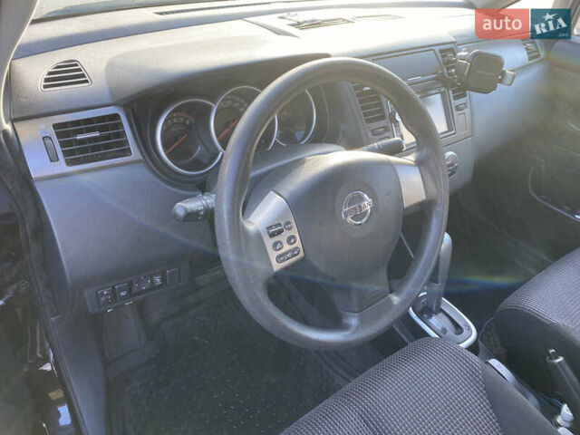 Черный Ниссан Тиида, объемом двигателя 1.6 л и пробегом 138 тыс. км за 7700 $, фото 17 на Automoto.ua