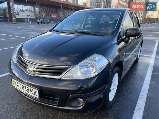 Черный Ниссан Тиида, объемом двигателя 1.6 л и пробегом 138 тыс. км за 7700 $, фото 1 на Automoto.ua