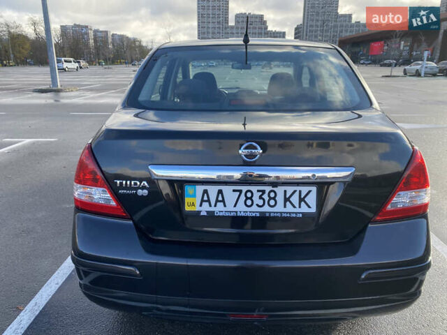 Черный Ниссан Тиида, объемом двигателя 1.6 л и пробегом 138 тыс. км за 7700 $, фото 8 на Automoto.ua