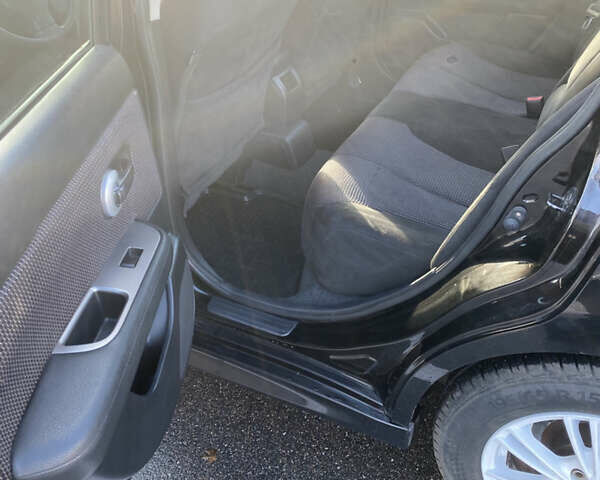 Черный Ниссан Тиида, объемом двигателя 1.6 л и пробегом 138 тыс. км за 7700 $, фото 15 на Automoto.ua