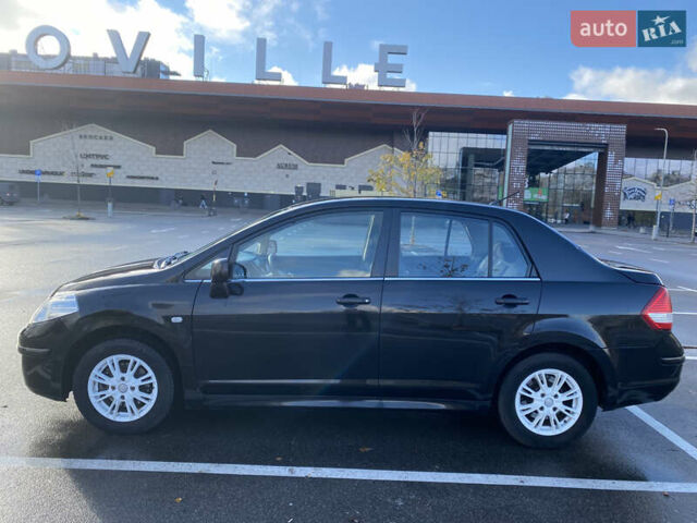 Черный Ниссан Тиида, объемом двигателя 1.6 л и пробегом 138 тыс. км за 7700 $, фото 11 на Automoto.ua