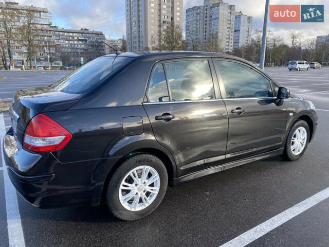Черный Ниссан Тиида, объемом двигателя 1.6 л и пробегом 138 тыс. км за 7700 $, фото 6 на Automoto.ua