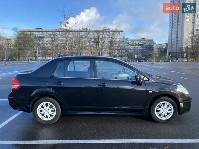 Черный Ниссан Тиида, объемом двигателя 1.6 л и пробегом 138 тыс. км за 7700 $, фото 5 на Automoto.ua
