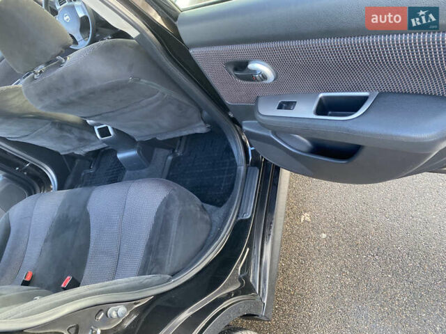 Черный Ниссан Тиида, объемом двигателя 1.6 л и пробегом 138 тыс. км за 7700 $, фото 24 на Automoto.ua