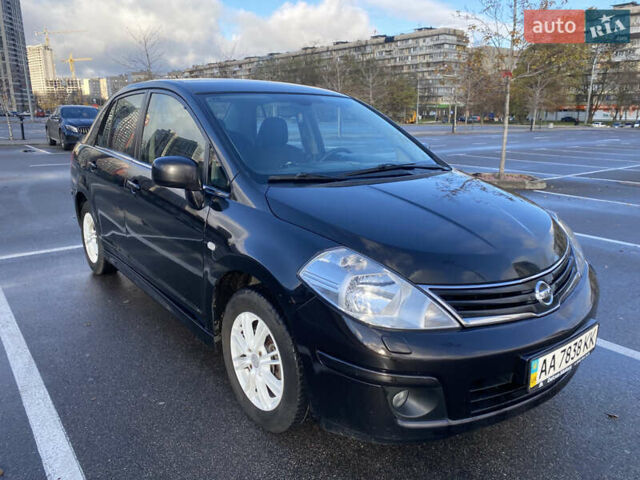 Черный Ниссан Тиида, объемом двигателя 1.6 л и пробегом 138 тыс. км за 7700 $, фото 3 на Automoto.ua