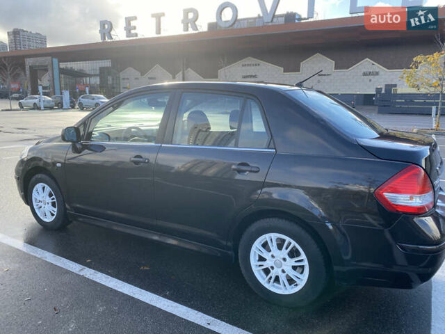 Черный Ниссан Тиида, объемом двигателя 1.6 л и пробегом 138 тыс. км за 7700 $, фото 10 на Automoto.ua