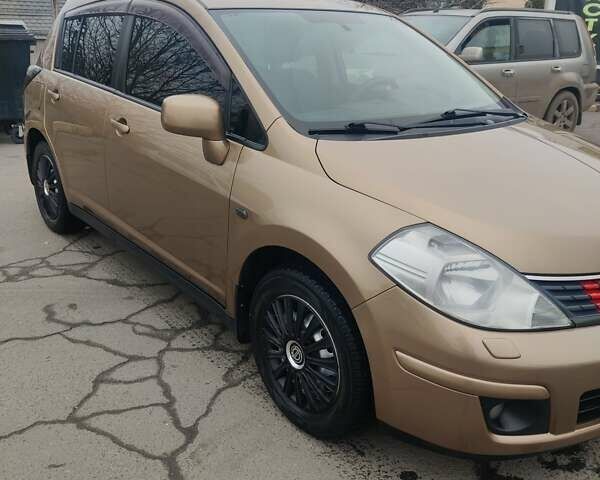 Коричневий Ніссан Тііда, об'ємом двигуна 1.6 л та пробігом 200 тис. км за 6490 $, фото 38 на Automoto.ua