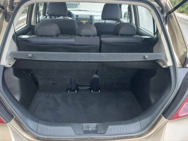 Коричневый Ниссан Тиида, объемом двигателя 1.6 л и пробегом 100 тыс. км за 6100 $, фото 11 на Automoto.ua