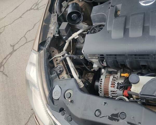 Коричневий Ніссан Тііда, об'ємом двигуна 1.6 л та пробігом 200 тис. км за 6490 $, фото 33 на Automoto.ua