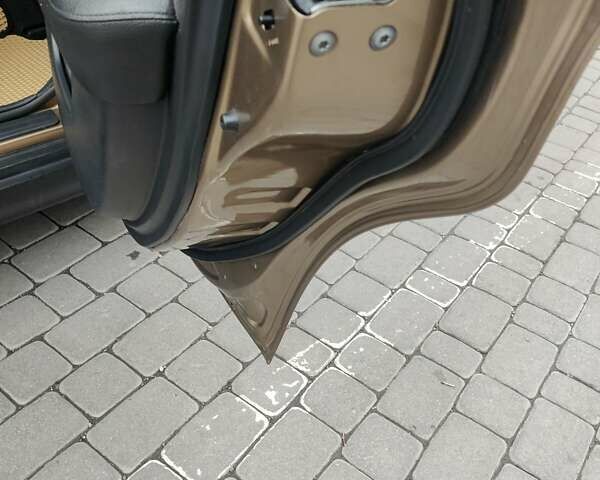 Коричневий Ніссан Тііда, об'ємом двигуна 1.6 л та пробігом 200 тис. км за 6490 $, фото 12 на Automoto.ua