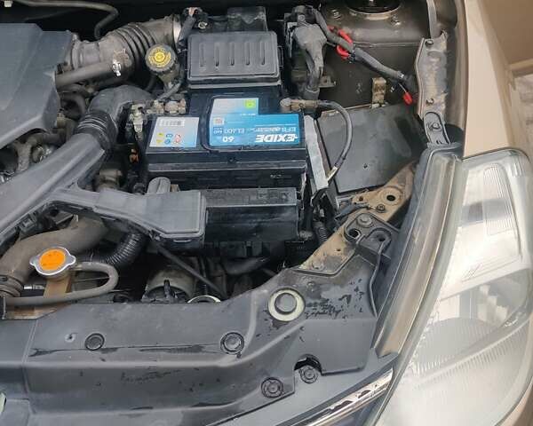 Коричневий Ніссан Тііда, об'ємом двигуна 1.6 л та пробігом 200 тис. км за 6490 $, фото 35 на Automoto.ua