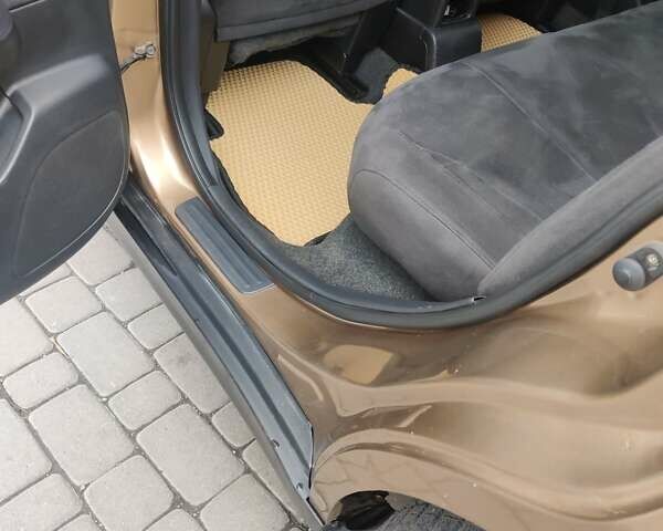 Коричневий Ніссан Тііда, об'ємом двигуна 1.6 л та пробігом 200 тис. км за 6490 $, фото 9 на Automoto.ua