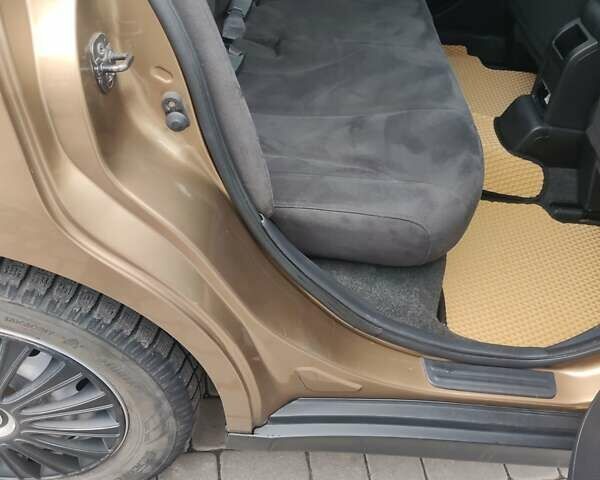 Коричневий Ніссан Тііда, об'ємом двигуна 1.6 л та пробігом 200 тис. км за 6490 $, фото 13 на Automoto.ua