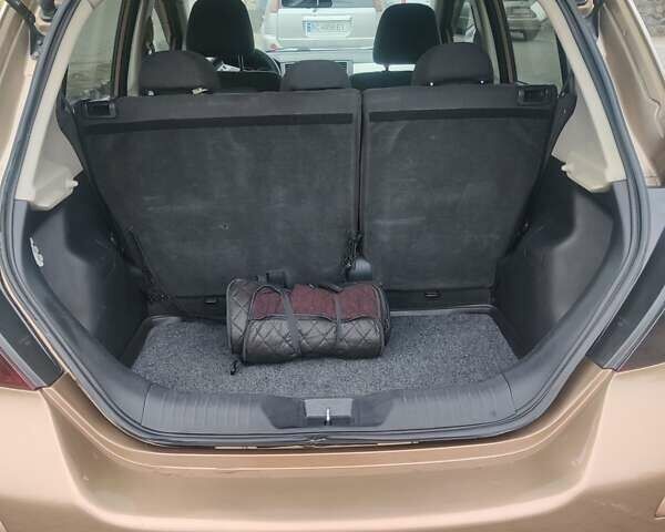 Коричневий Ніссан Тііда, об'ємом двигуна 1.6 л та пробігом 200 тис. км за 6490 $, фото 23 на Automoto.ua