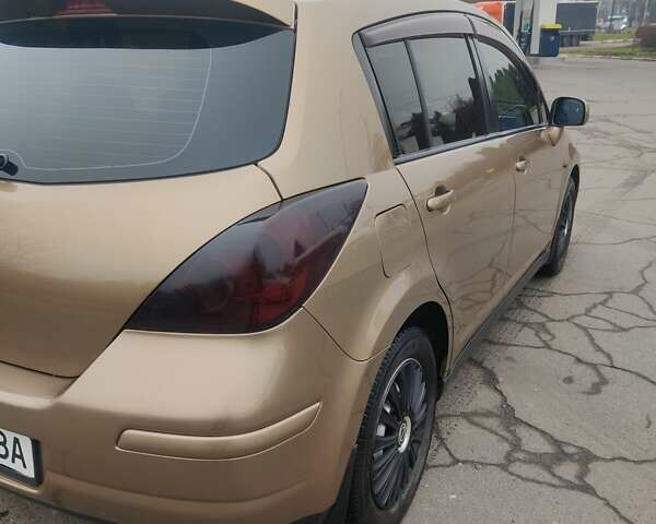 Коричневий Ніссан Тііда, об'ємом двигуна 1.6 л та пробігом 200 тис. км за 6490 $, фото 30 на Automoto.ua