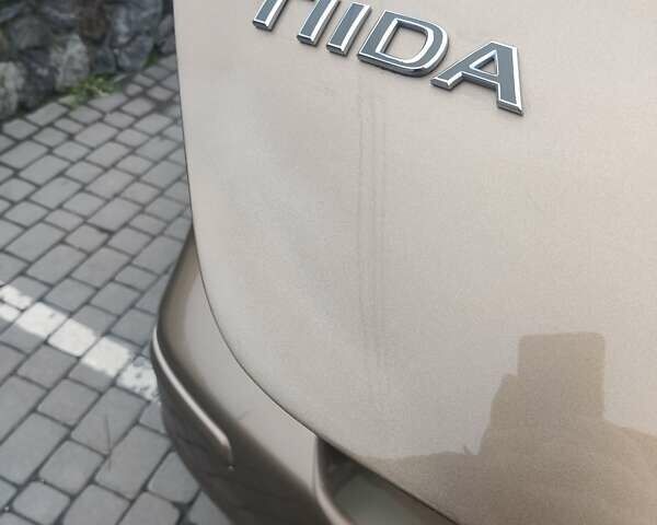 Коричневий Ніссан Тііда, об'ємом двигуна 1.6 л та пробігом 200 тис. км за 6490 $, фото 21 на Automoto.ua