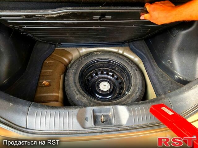 Коричневый Ниссан Тиида, объемом двигателя 1.5 л и пробегом 260 тыс. км за 5000 $, фото 10 на Automoto.ua