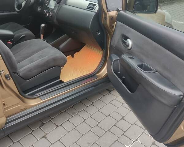 Коричневий Ніссан Тііда, об'ємом двигуна 1.6 л та пробігом 200 тис. км за 6490 $, фото 19 на Automoto.ua