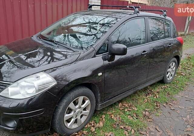 Коричневий Ніссан Тііда, об'ємом двигуна 1.6 л та пробігом 205 тис. км за 7500 $, фото 5 на Automoto.ua