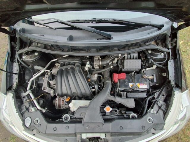 Коричневый Ниссан Тиида, объемом двигателя 1.5 л и пробегом 87 тыс. км за 9000 $, фото 6 на Automoto.ua