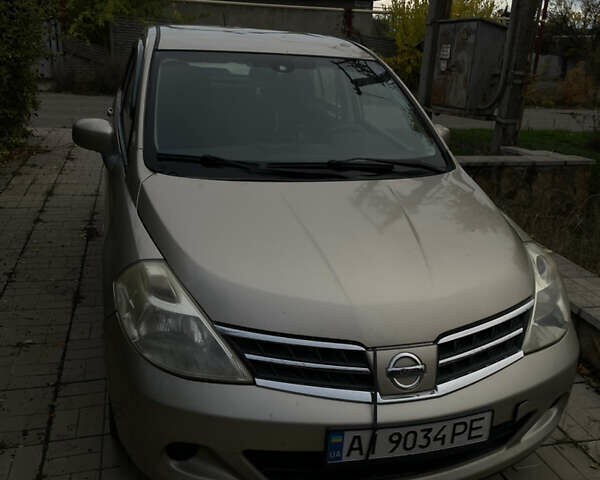 Коричневый Ниссан Тиида, объемом двигателя 1.5 л и пробегом 75 тыс. км за 3400 $, фото 6 на Automoto.ua