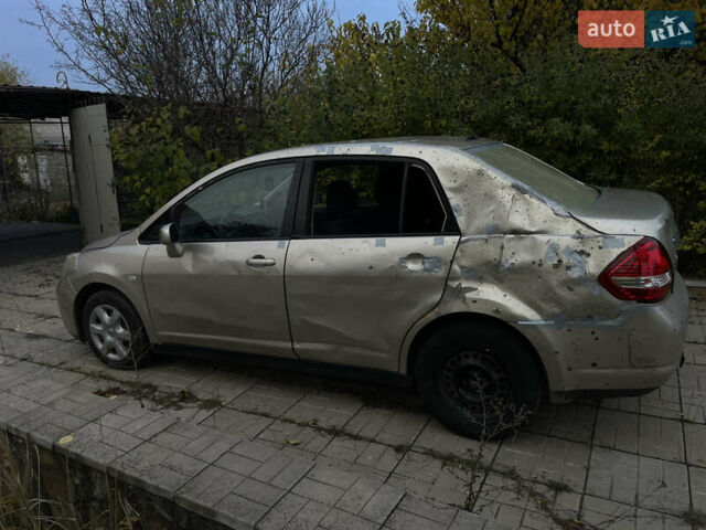 Коричневый Ниссан Тиида, объемом двигателя 1.5 л и пробегом 75 тыс. км за 3400 $, фото 12 на Automoto.ua