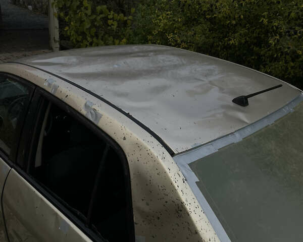 Коричневый Ниссан Тиида, объемом двигателя 1.5 л и пробегом 75 тыс. км за 3400 $, фото 11 на Automoto.ua