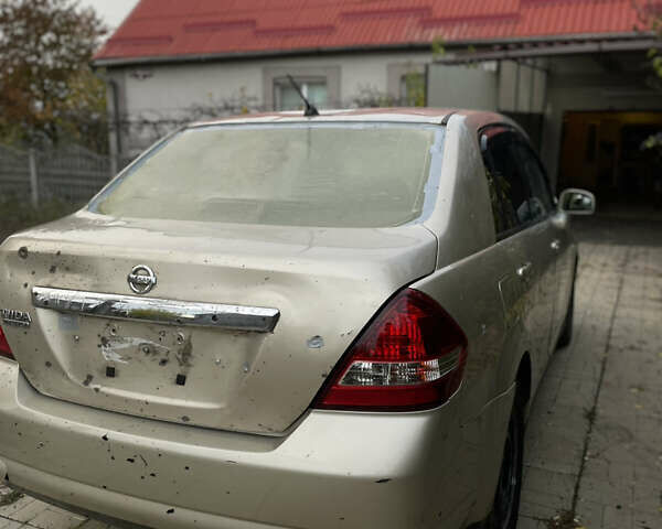 Коричневый Ниссан Тиида, объемом двигателя 1.5 л и пробегом 75 тыс. км за 3400 $, фото 4 на Automoto.ua