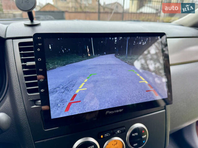 Красный Ниссан Тиида, объемом двигателя 1.6 л и пробегом 100 тыс. км за 6500 $, фото 45 на Automoto.ua