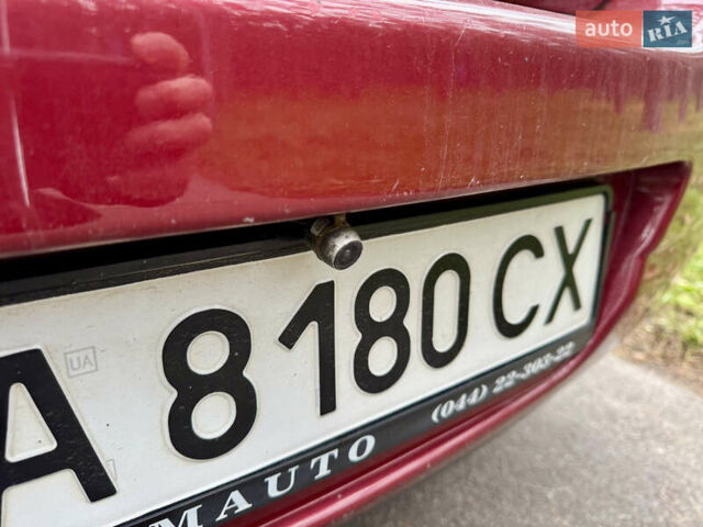 Красный Ниссан Тиида, объемом двигателя 1.6 л и пробегом 100 тыс. км за 6500 $, фото 7 на Automoto.ua