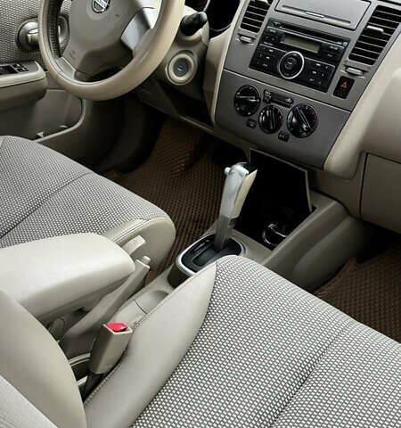 Красный Ниссан Тиида, объемом двигателя 1.6 л и пробегом 160 тыс. км за 6550 $, фото 7 на Automoto.ua