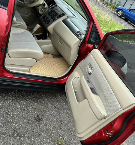 Красный Ниссан Тиида, объемом двигателя 1.6 л и пробегом 160 тыс. км за 6550 $, фото 5 на Automoto.ua