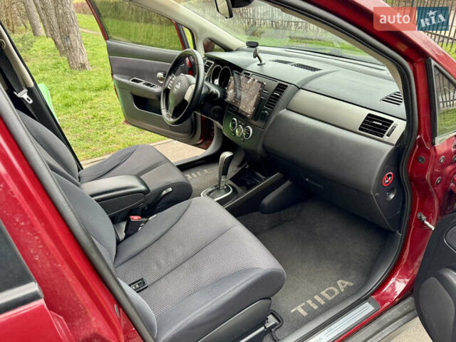 Красный Ниссан Тиида, объемом двигателя 1.6 л и пробегом 100 тыс. км за 6500 $, фото 21 на Automoto.ua