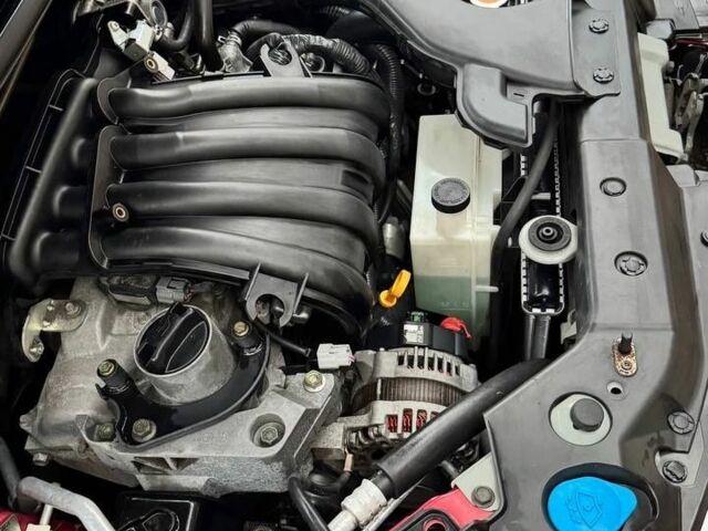 Красный Ниссан Тиида, объемом двигателя 1.6 л и пробегом 160 тыс. км за 6600 $, фото 12 на Automoto.ua