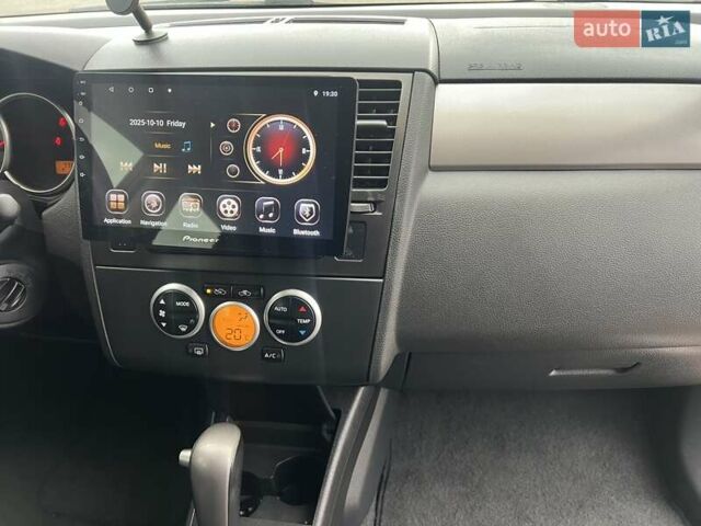 Красный Ниссан Тиида, объемом двигателя 1.6 л и пробегом 100 тыс. км за 6500 $, фото 15 на Automoto.ua