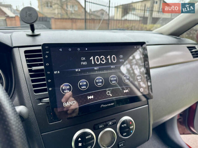 Красный Ниссан Тиида, объемом двигателя 1.6 л и пробегом 100 тыс. км за 6500 $, фото 47 на Automoto.ua