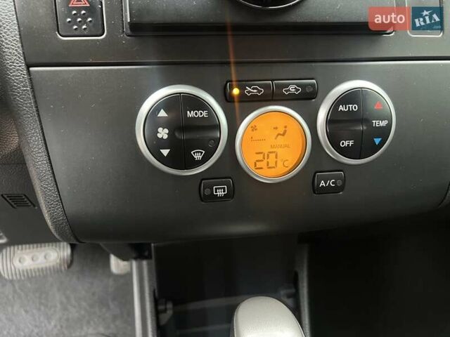 Красный Ниссан Тиида, объемом двигателя 1.6 л и пробегом 100 тыс. км за 6500 $, фото 16 на Automoto.ua