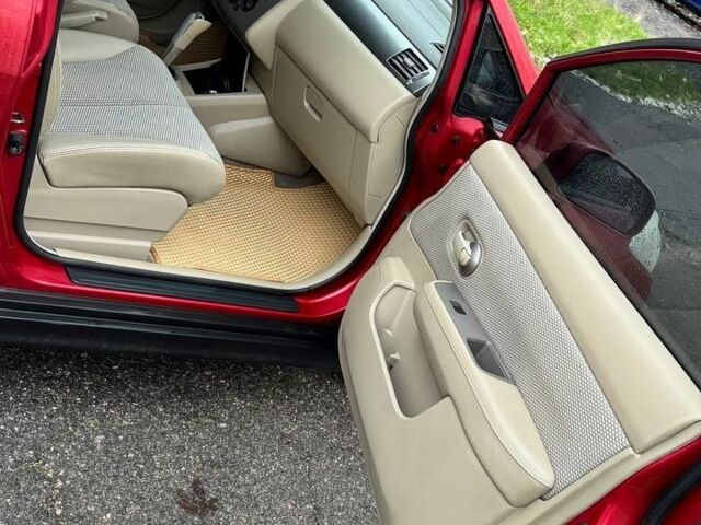 Красный Ниссан Тиида, объемом двигателя 1.6 л и пробегом 160 тыс. км за 6600 $, фото 5 на Automoto.ua