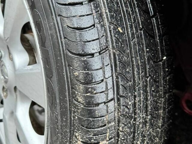 Красный Ниссан Тиида, объемом двигателя 1.6 л и пробегом 160 тыс. км за 6600 $, фото 10 на Automoto.ua