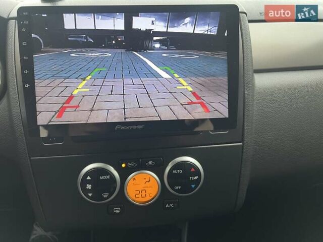 Красный Ниссан Тиида, объемом двигателя 1.6 л и пробегом 100 тыс. км за 6500 $, фото 12 на Automoto.ua