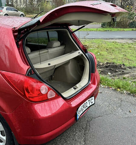 Красный Ниссан Тиида, объемом двигателя 1.6 л и пробегом 160 тыс. км за 6550 $, фото 8 на Automoto.ua